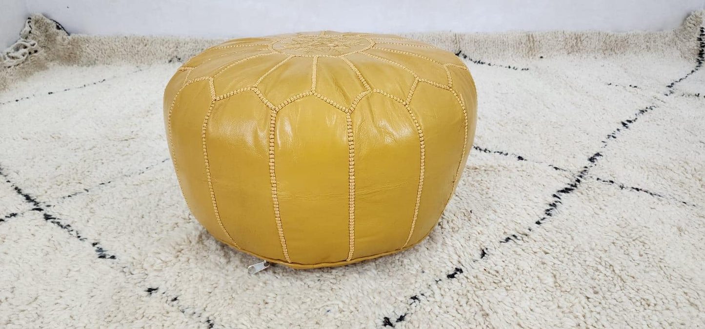 Moroccan Leather Pouf — styled in a modern boho living room