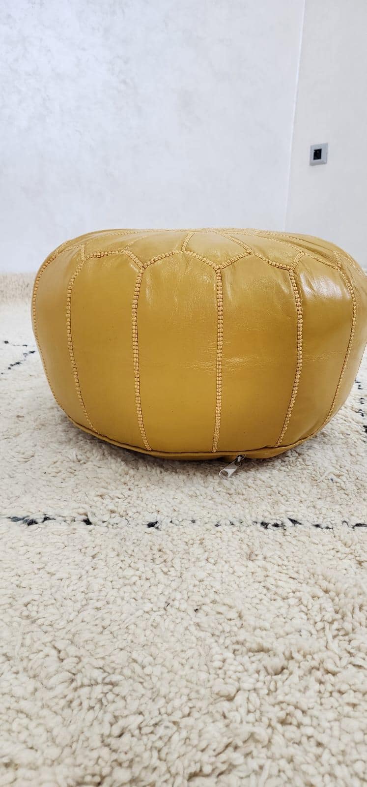 Moroccan Leather Pouf — paired with neutral home decor