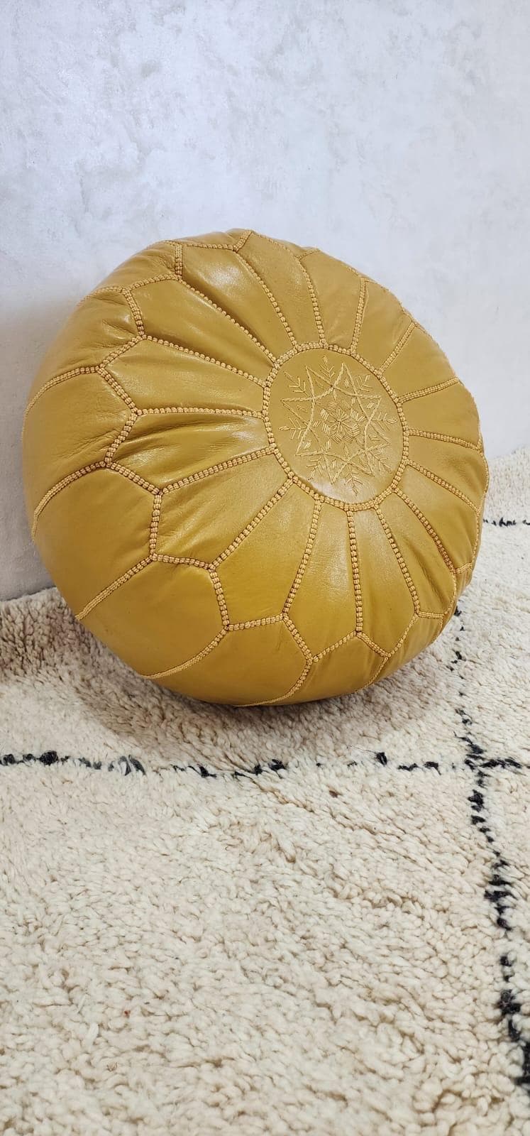 Moroccan Leather Pouf — color variation in natural light