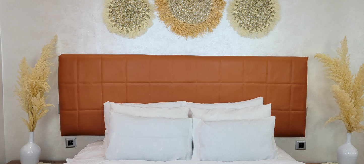 Upholstered Leather Headboard — styled in a modern boho living room