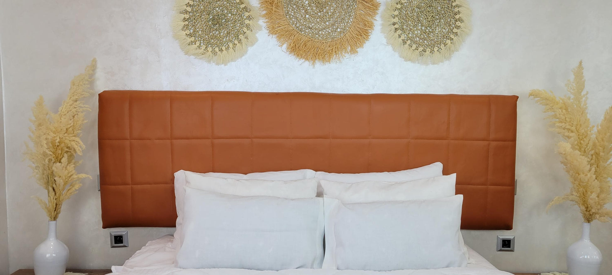 Upholstered Leather Headboard — styled in a modern boho living room