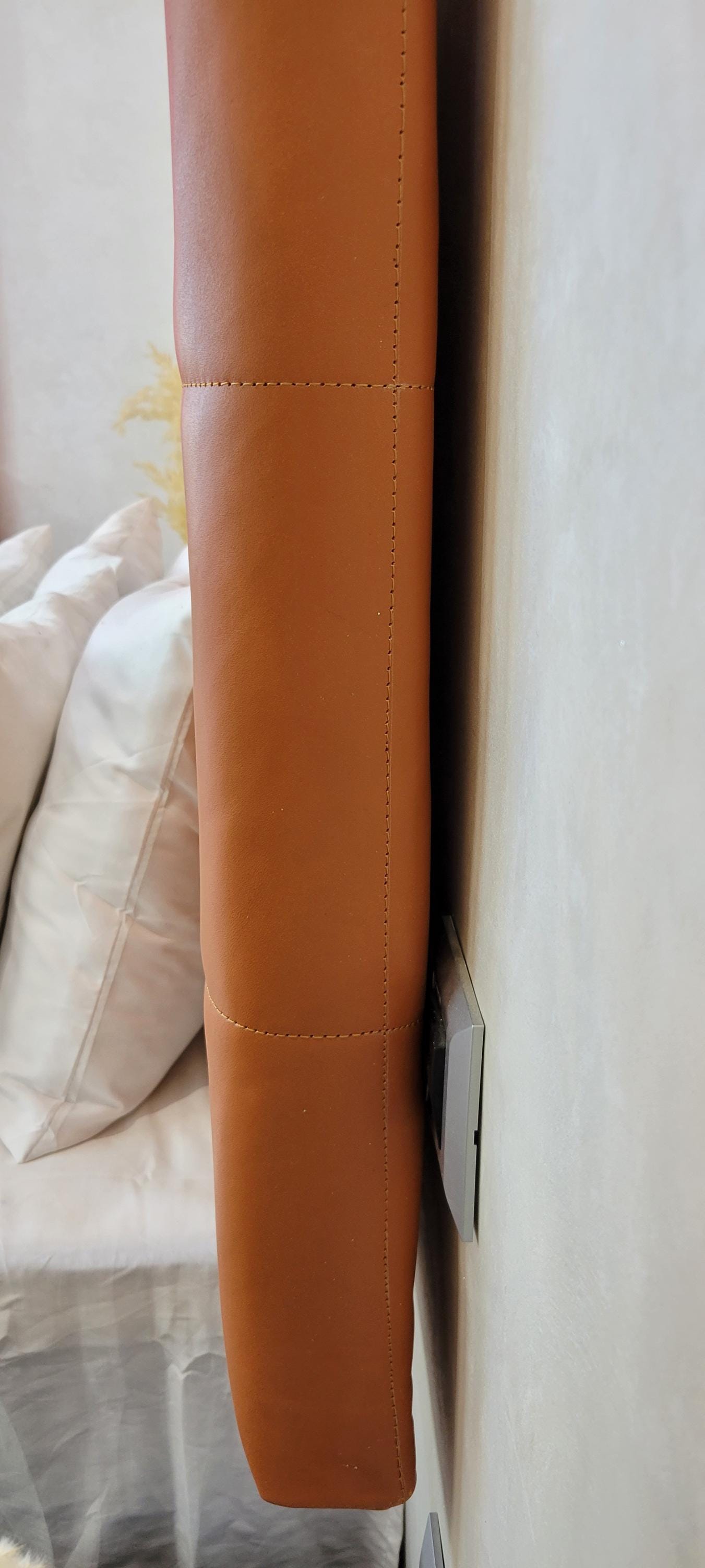 Upholstered Leather Headboard — paired with neutral home decor