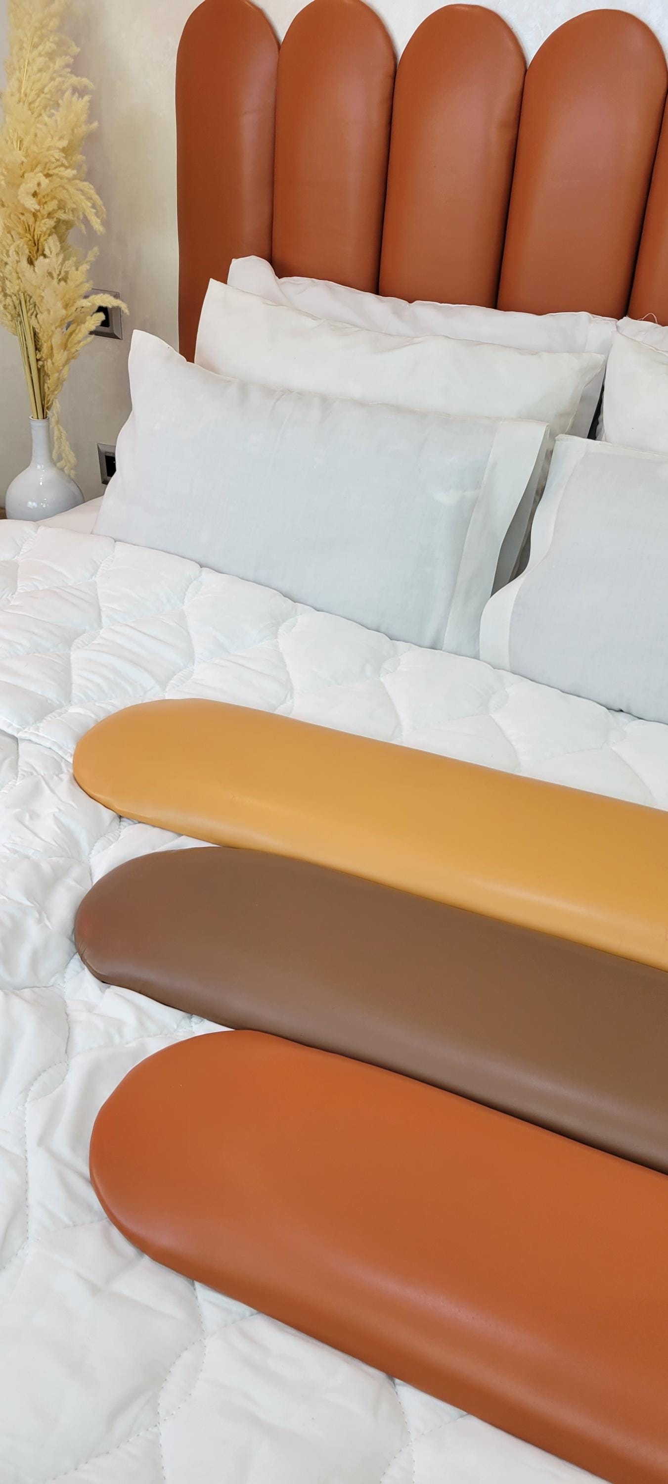 Upholstered Leather Headboard — color variation in natural light